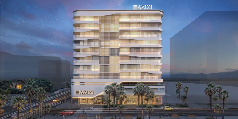Render of the front of Azizi Raffi at night, with shops on the ground floor