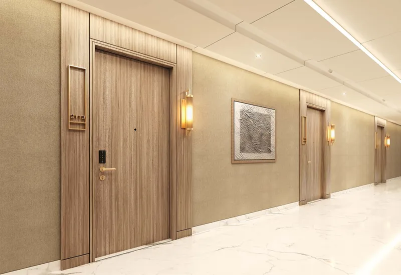 Apartment corridor with marble flooring and timber doors at Azizi Riviera