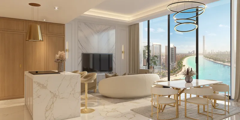 Render of a living room and kitchen island at Riviera Rêve with a view of the lagoon