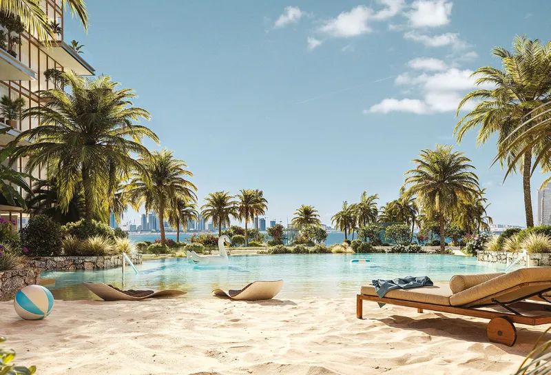 Render of a sandy-edged pool with loungers and palm trees by the sea