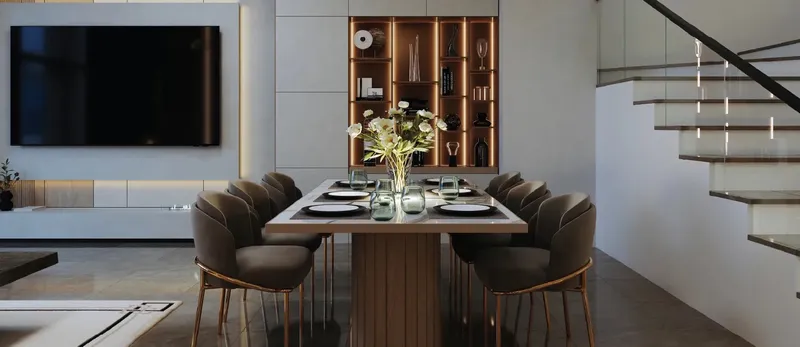 Dining area in a Baia townhouse with a glass-balustrade staircase (developer render)