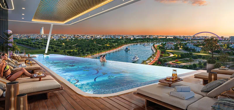 Infinity pool at Bayz 102 by Danube overlooking the Dubai Canal at dusk