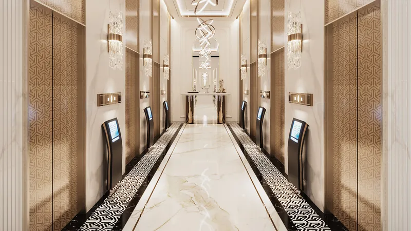 Lift lobby with gold-finished doors at Bayz 102 by Danube