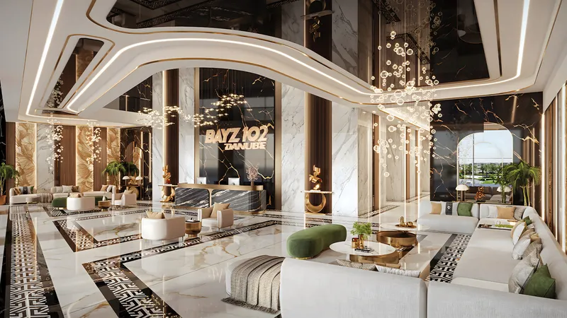 Marble lobby with seating and chandeliers at Bayz 102 by Danube