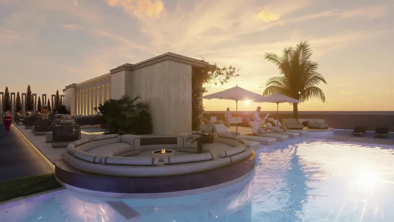 Render of the rooftop pool and sunken seating at Beverly Park at dusk