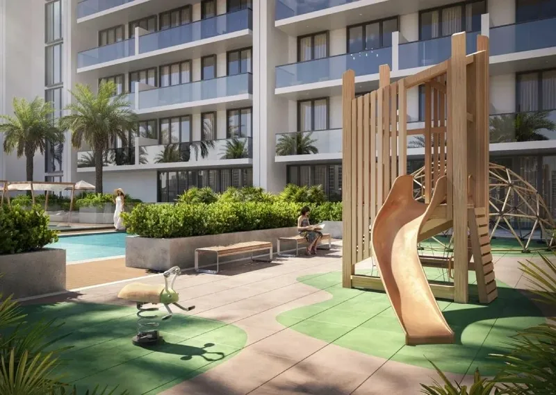 Render of the children's play area beside the pool at Binghatti Amberhall