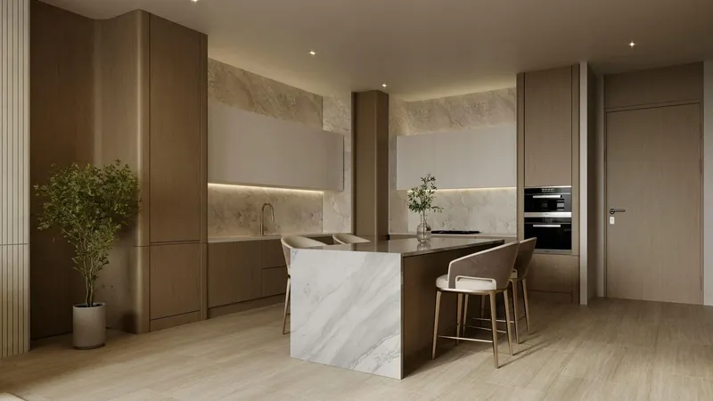 Render of a kitchen with a marble island in a Binghatti Amberhall apartment