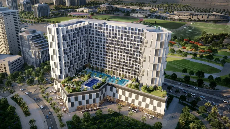 Aerial render of Binghatti Cullinan showing the curved residential block around a podium pool deck