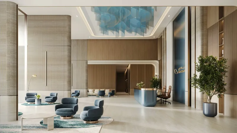 Render of the Binghatti Cullinan residents' lobby with lounge seating and a blue ceiling feature