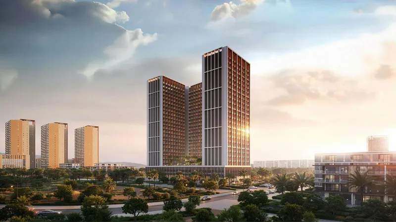 Render of the Binghatti Elite towers in Dubai Production City at sunset