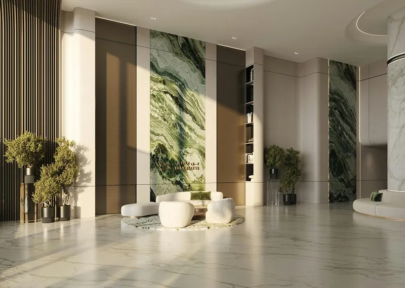 Render of the Binghatti Grove lobby with green marble walls and lounge seating