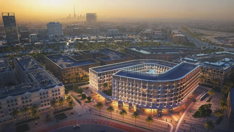 Aerial render of Binghatti Hillcrest in Arjan at sunset, showing the curved building wrapped around its central courtyard