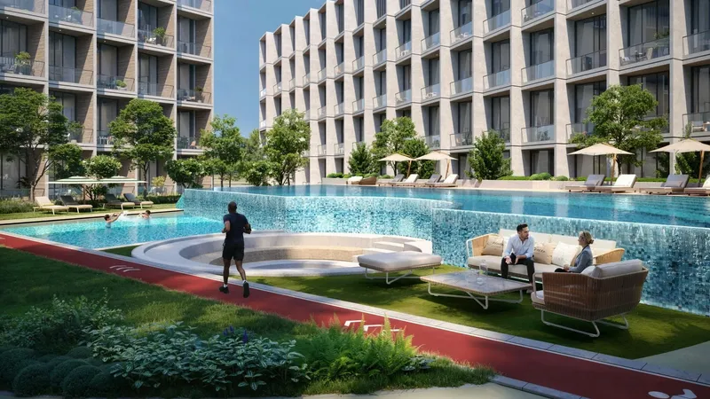 Render of the pool, sunken seating and jogging track in the Binghatti Hillcrest courtyard