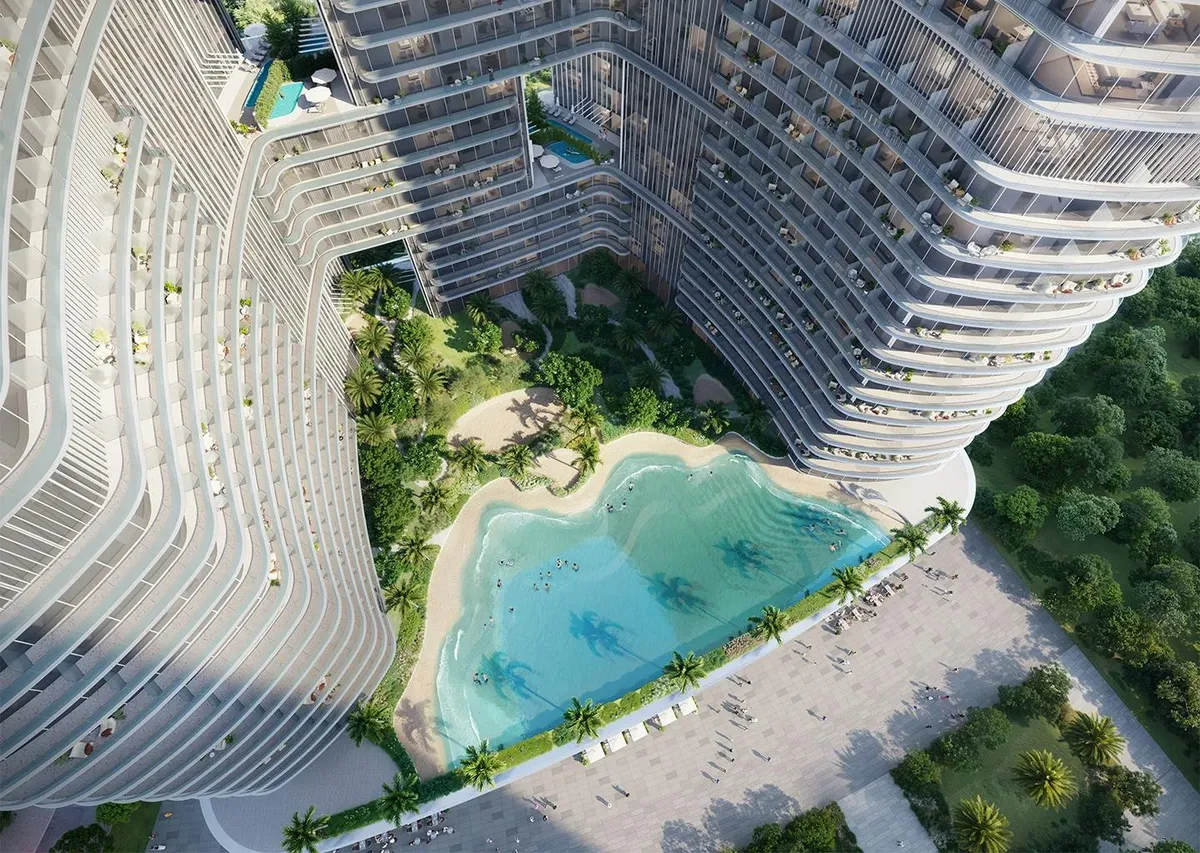 Render from above of the beach-style pool and palms on the Binghatti Hillviews podium