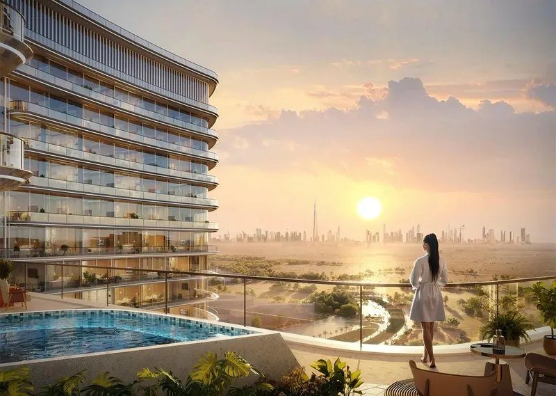 Render of a pool terrace at Binghatti Hillviews at sunset, looking towards the Dubai skyline
