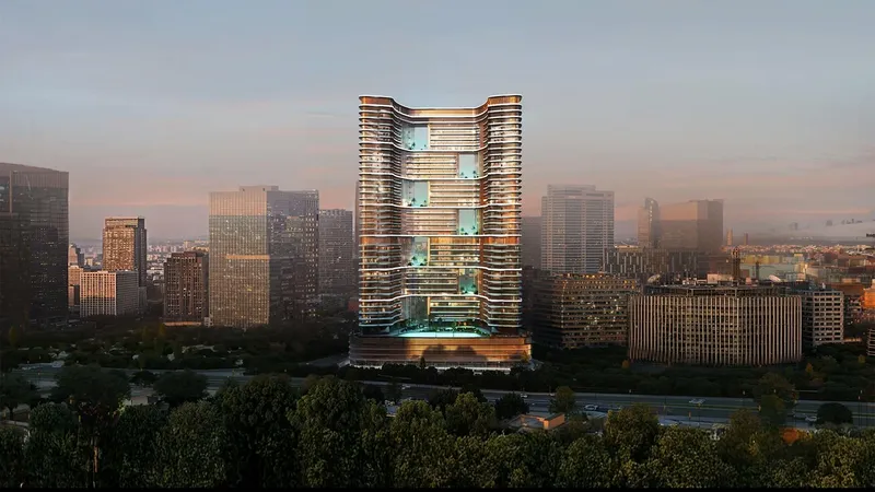 Render of the Binghatti Hillviews tower in Dubai Science Park at dusk, with its podium pool lit below