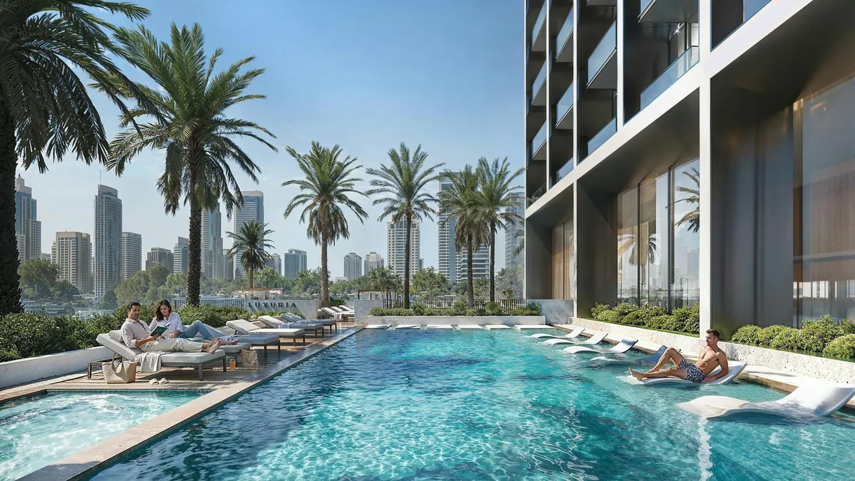 Render of the swimming pool on the Binghatti Luxuria amenity deck, with palms and loungers