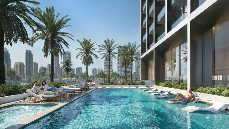 Render of the swimming pool on the Binghatti Luxuria amenity deck, with palms and loungers