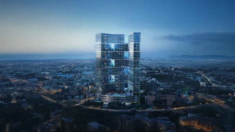 Aerial render of Binghatti Sky Terraces lit at blue hour, with the city spreading out behind