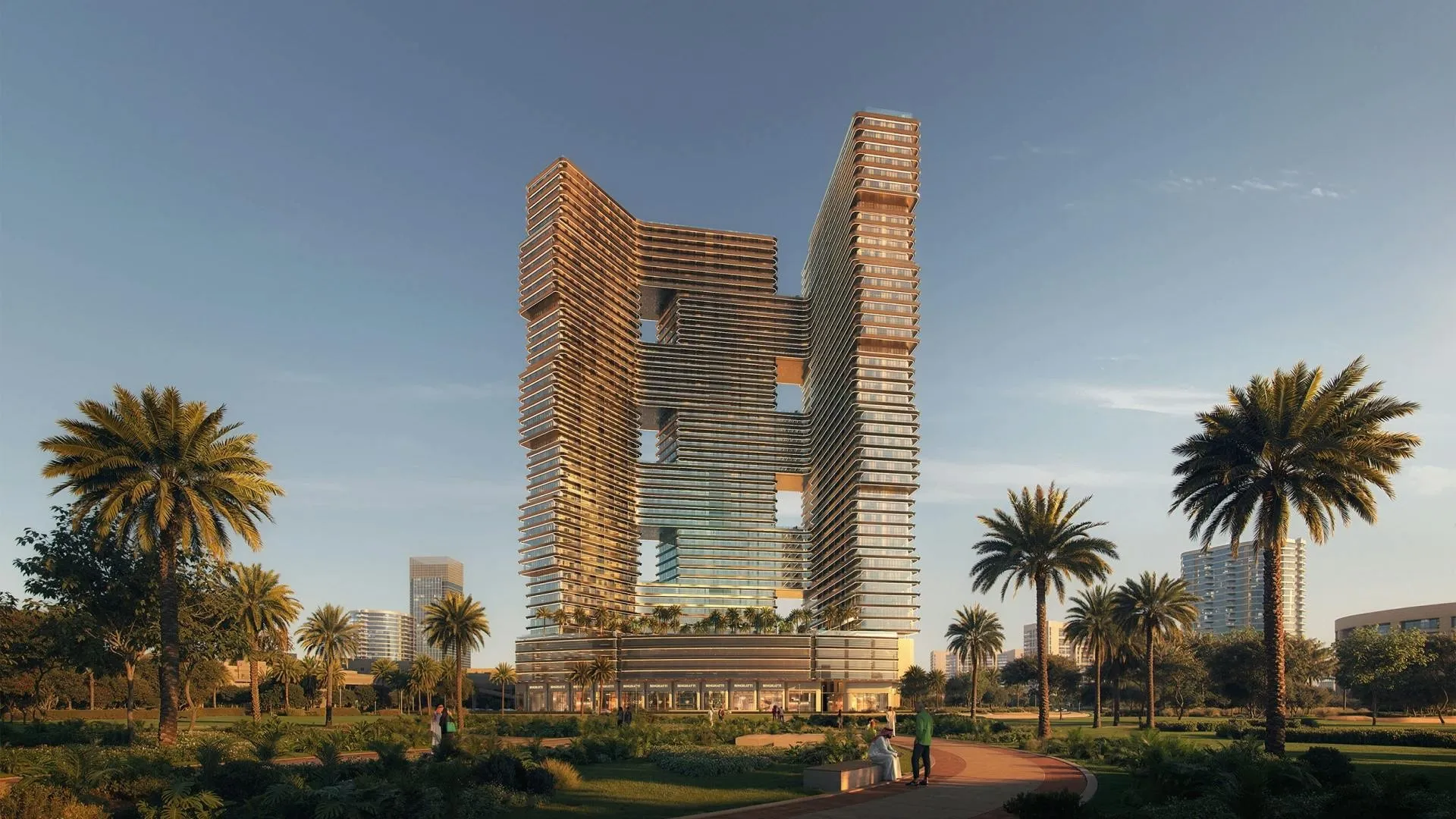 Computer-generated render of Binghatti Sky Terraces in Motor City by day, its two linked wings lined with deep curved terraces above a landscaped park