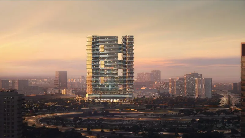 Aerial render of Binghatti Sky Terraces at sunset, rising above the surrounding buildings of Motor City