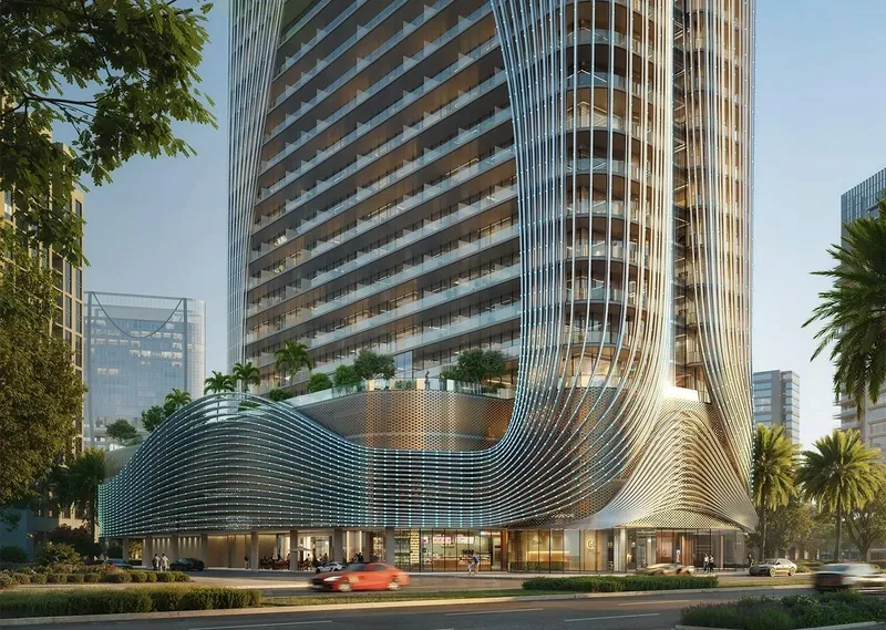 Street-level render of the curved podium and lower floors of Binghatti Skyhall