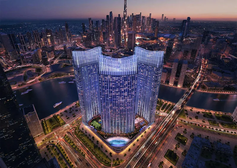 Aerial render of Binghatti Skyrise lit at night among the Business Bay skyline