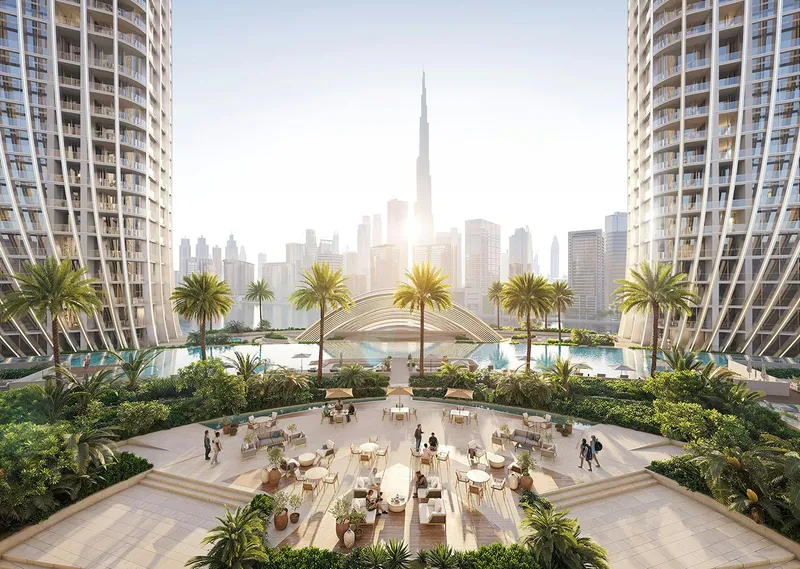 Render of the landscaped podium seating area at Binghatti Skyrise, looking towards the Burj Khalifa