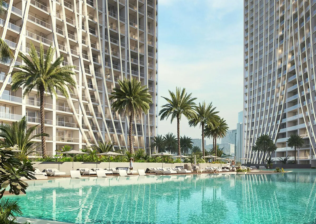 Render of the Binghatti Skyrise podium pool with palms between the towers