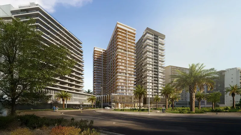Render of the Binghatti Starlight towers in Al Jaddaf seen from the street, with palms in front