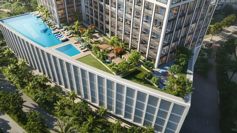 Aerial render of the Binghatti Titania podium deck with adult and kids' pools and gardens