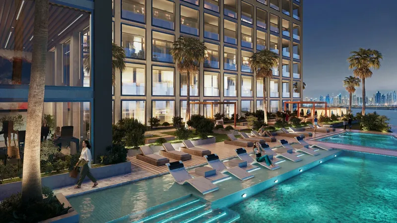 Render of the Binghatti Titania pool with in-water loungers in the evening