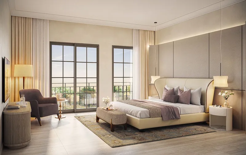 Master bedroom in a Marbella villa with full-height glazing to a balcony