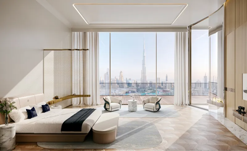 Render of a bedroom with a view of Burj Khalifa at Bugatti Residences by Binghatti