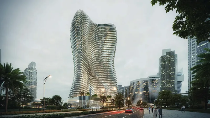 Computer-generated render of the curved Bugatti Residences by Binghatti tower in Business Bay at dusk