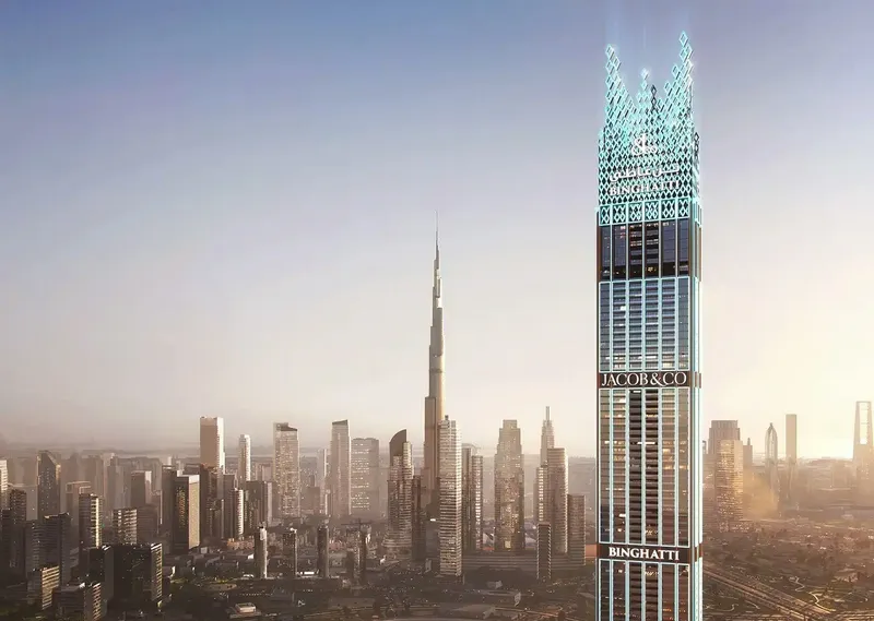 Render of the upper floors and crown of Burj Binghatti Jacob & Co Residences by day, with the Burj Khalifa behind