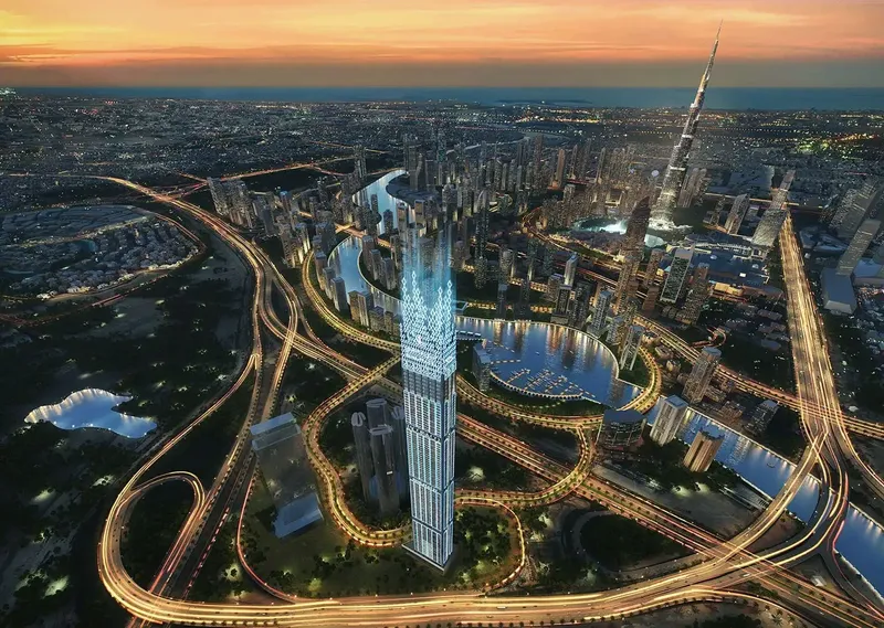 Aerial night render of Burj Binghatti Jacob & Co Residences in Business Bay, with the Burj Khalifa beyond