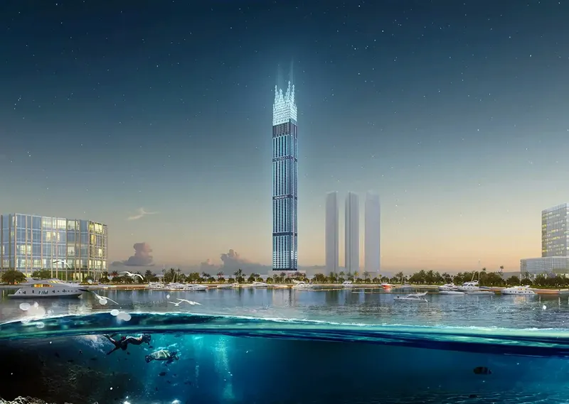 Render of Burj Binghatti Jacob & Co Residences seen across the water at dusk
