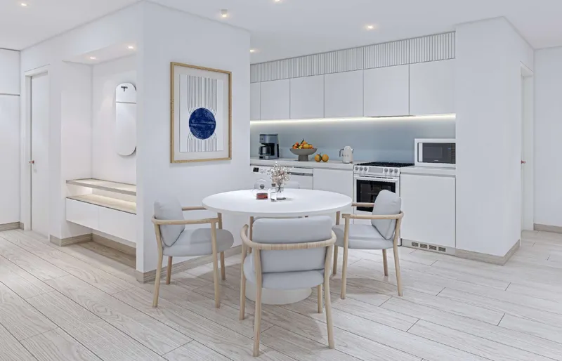 Render of an open kitchen and dining corner in a Cape Hayat apartment