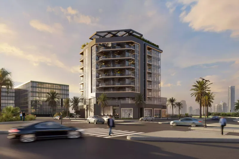 Street view of Celeste in daylight, showing its balconies and ground-floor shops