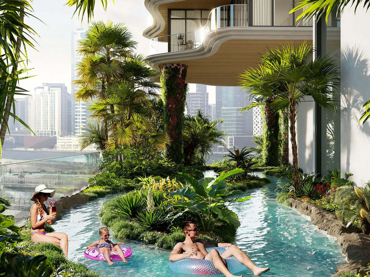 Residents floating along the planted lazy river on the podium of Chic Tower