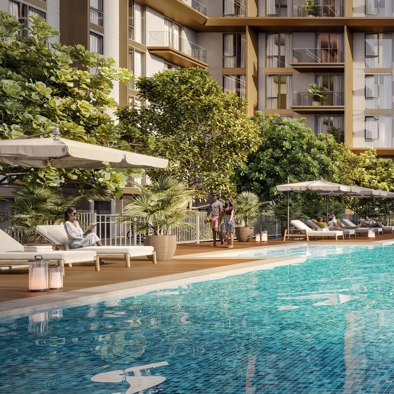 Render of the Club Place pool with loungers, parasols and planting below the apartment balconies