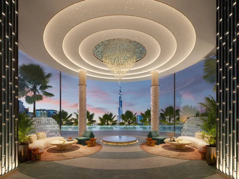 Circular lounge at Couture by Cavalli with a chandelier and full-height glazing facing the lagoon