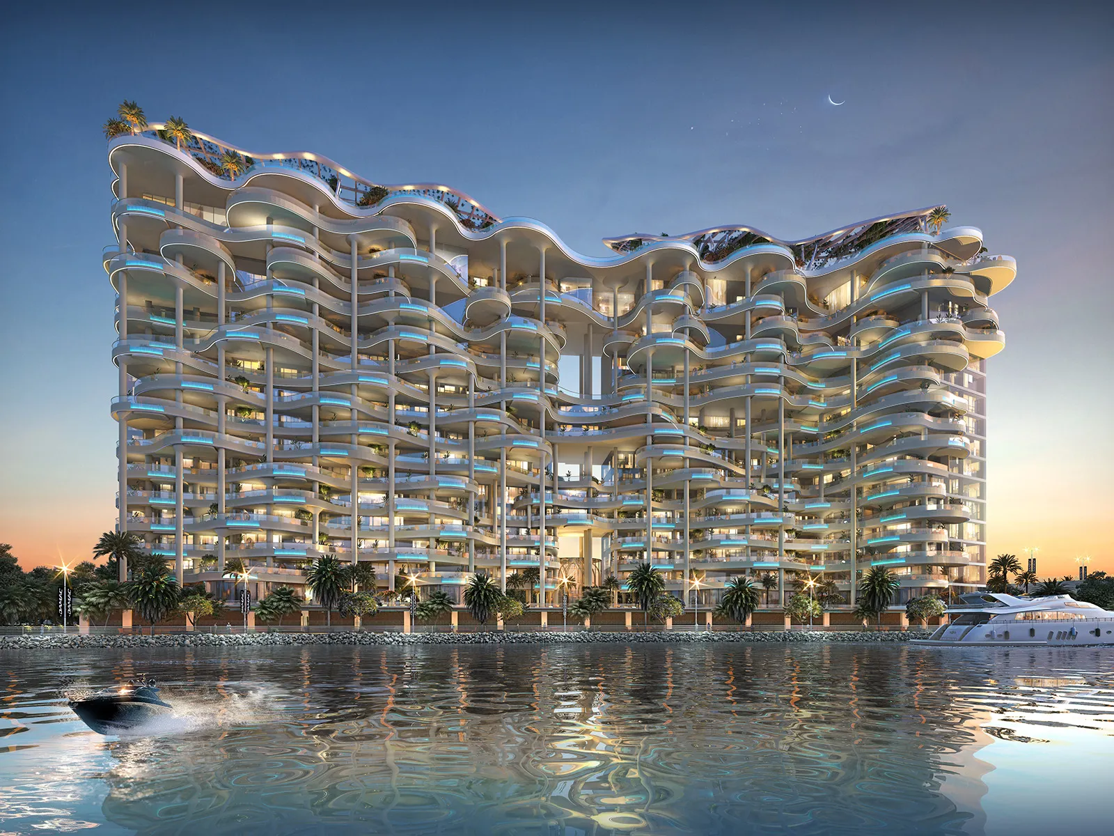 Couture by Cavalli tower by DAMAC seen across the Dubai Water Canal at dusk, with a yacht moored alongside