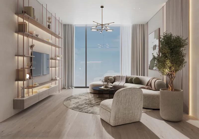 Furnished living room with floor-to-ceiling window and built-in shelving at Cove Grand by Imtiaz