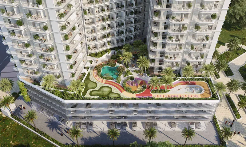 Podium deck at Cove Grand by Imtiaz with a kids' pool, mini golf, running track and seating among palms