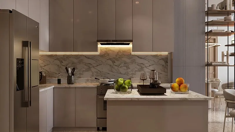 Kitchen with an island, handleless cabinets and built-in appliances in a Coventry 66 apartment