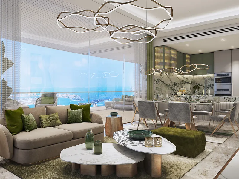 Living room at DAMAC Bay 2 by Cavalli with green accents and full-height windows facing the sea