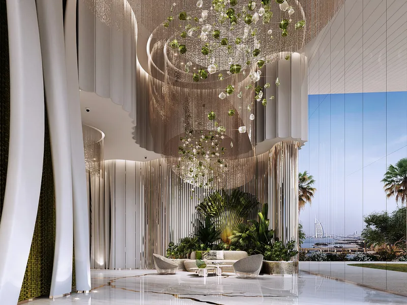 Double-height lobby at DAMAC Bay 2 by Cavalli with a hanging garden chandelier