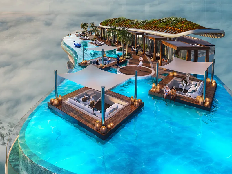 Rooftop pool with shaded floating lounge platforms at DAMAC Bay by Cavalli